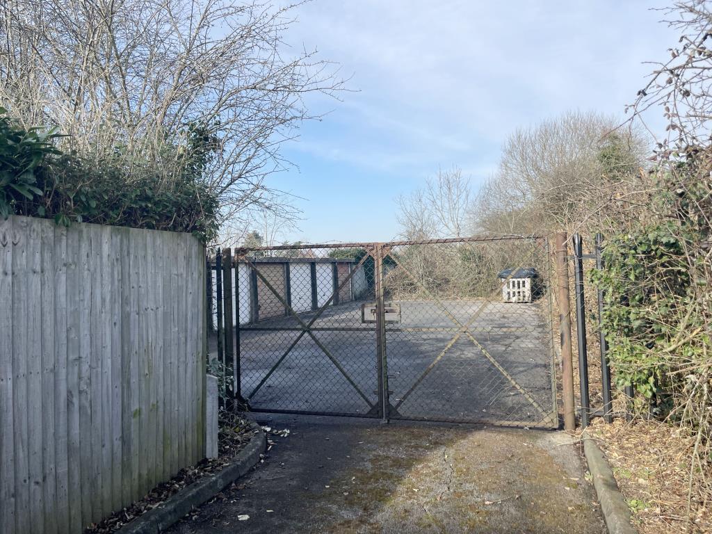 Lot: 5 - SEVEN GARAGES - view of access gates at garages in Marden